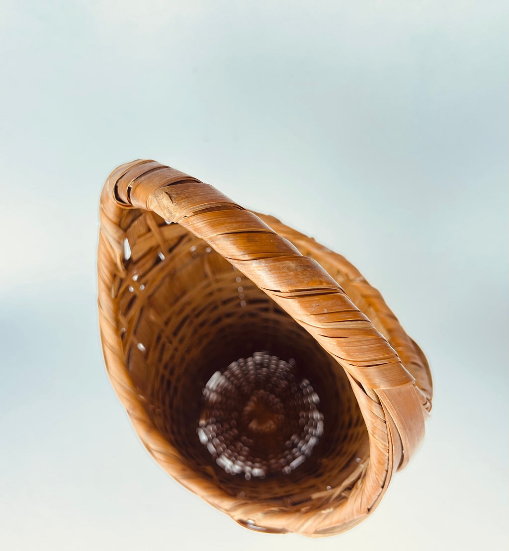 Product image for 'vintage 1970s tall wicker wine basket with pedestal base handle' (view 16c954)