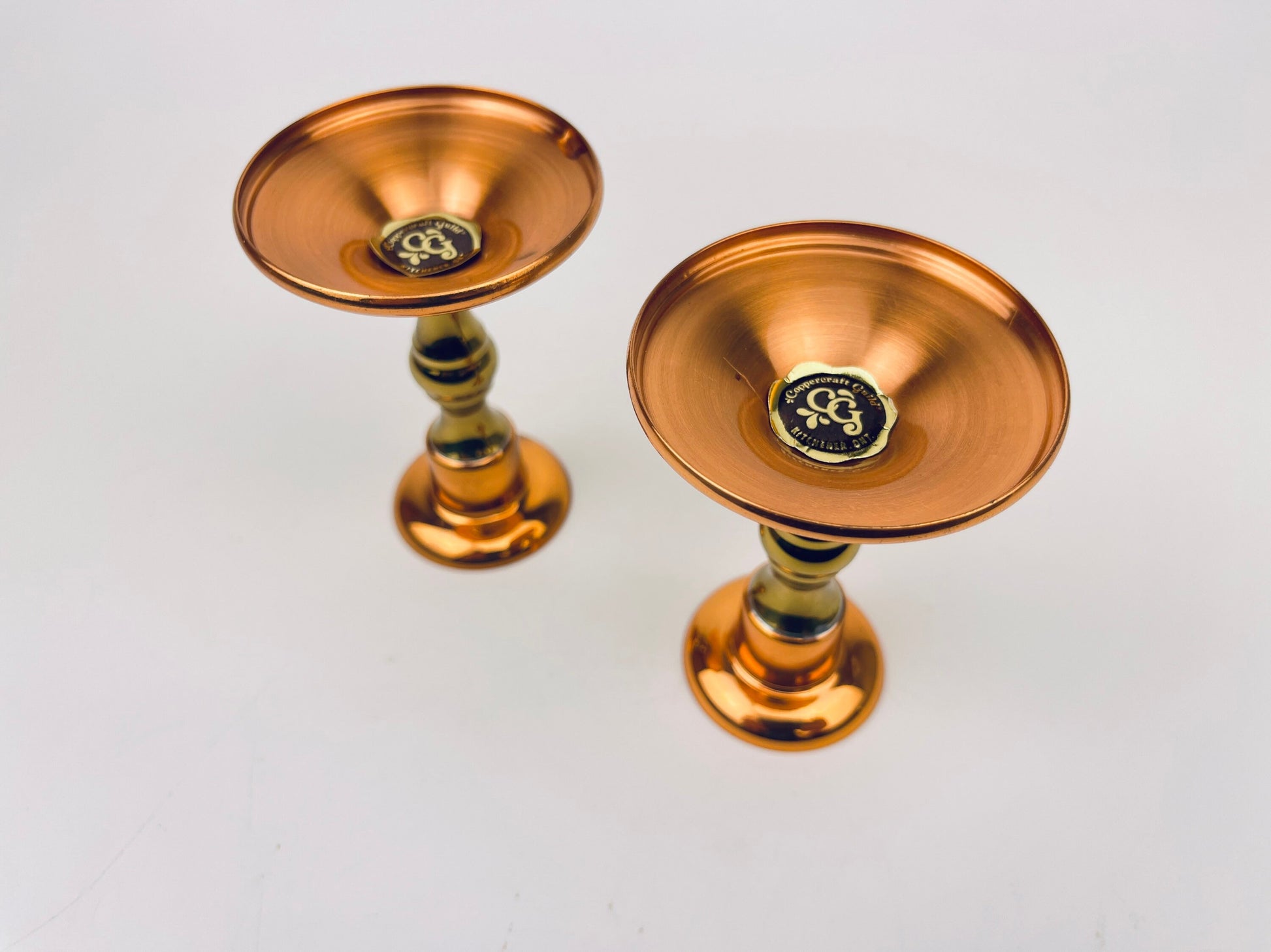 Product image for 'vintage copper brass candlestick holders attractive aged metal patina set of two 2 coppercraft guild' (view f74227)