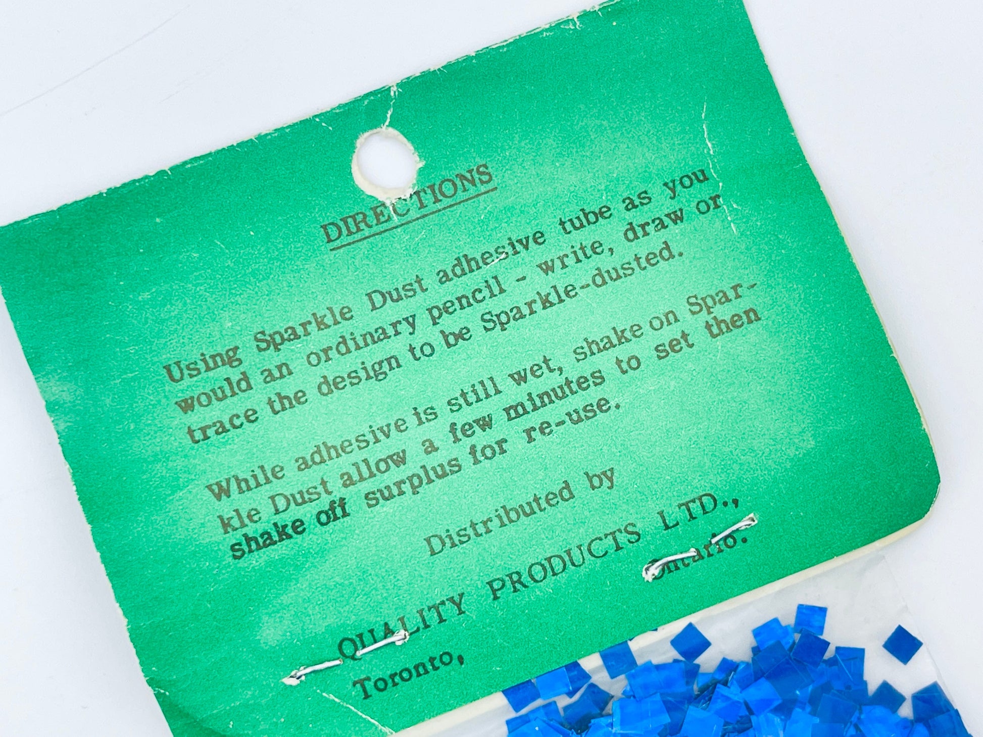 Product image for 'vintage holiday blue sparkle dust confetti glitter gift embellishment new old stock nos hanukkah christmas gift wrap glitter' (view 068765)