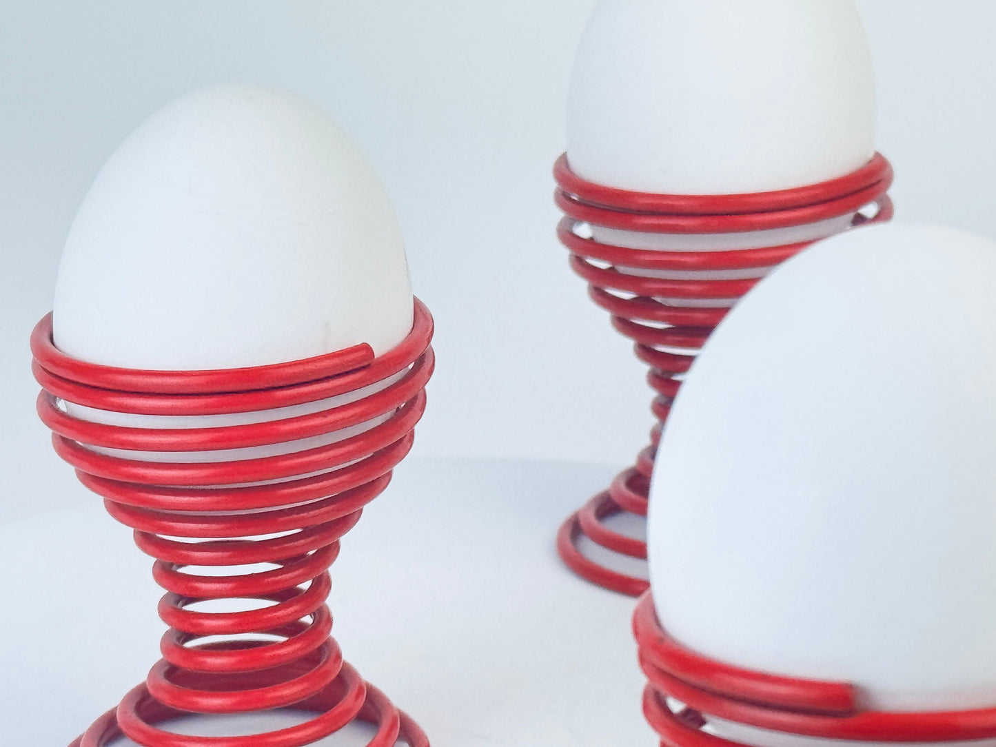 Product image for 'vintage 1980s metal spring egg skelter cup holders sets sold separately' (view 257e83)