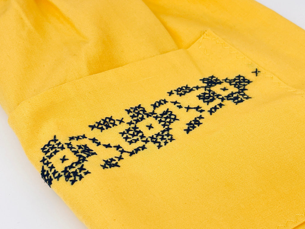 Product image for 'vintage yellow black embroidered waist apron right pocket detail' (view cb42d1)