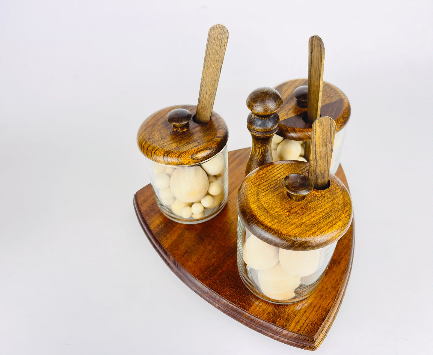 Product image for 'vintage mid century glass condiment caddy set trio of jars with wooden lids spoons' (view 407f79)