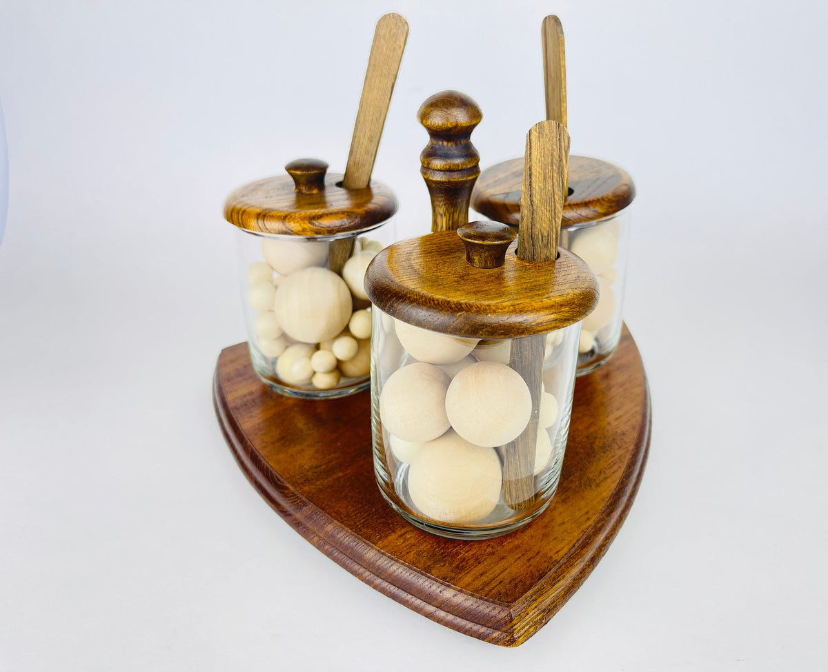 Product image for 'vintage mid century glass condiment caddy set trio of jars with wooden lids spoons' (view 53b9a5)