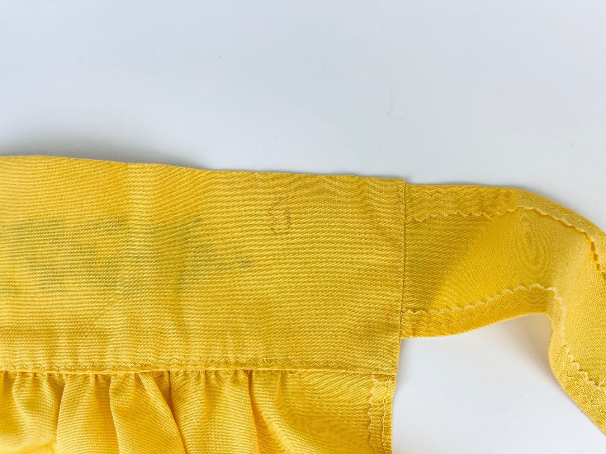 Product image for 'vintage yellow black embroidered waist apron right pocket detail' (view db0f0a)