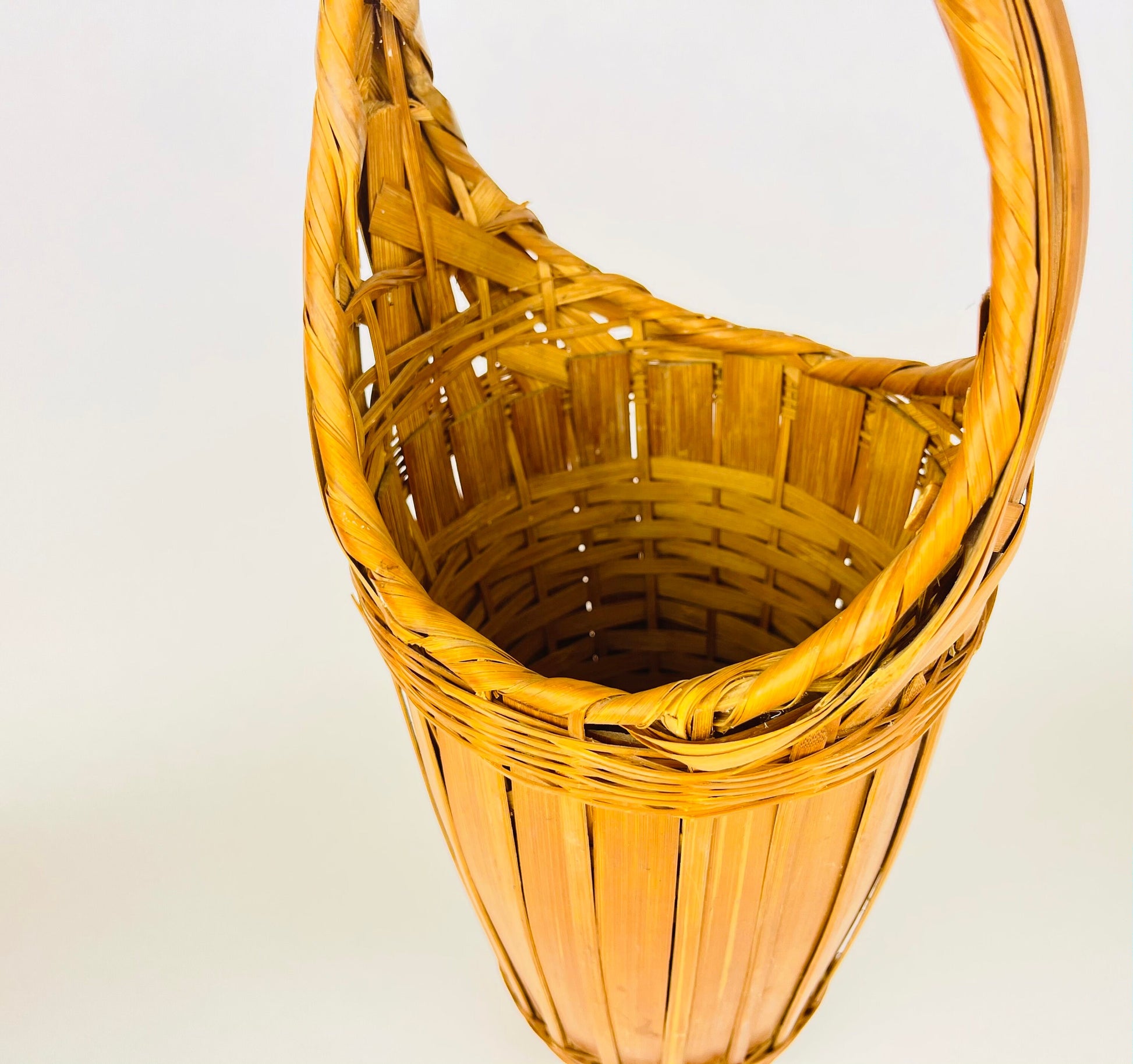 Product image for 'vintage 1970s tall wicker wine basket with pedestal base handle' (view f22413)