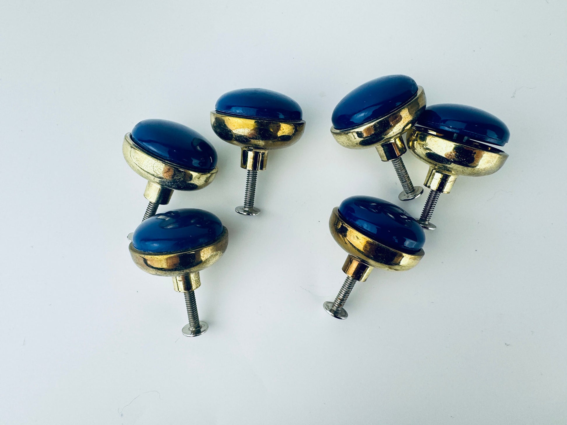 Product image for 'vintage 1980s blue plastic brass circular knob drawer pull hardware attractive aged brass patina' (view ea6201)