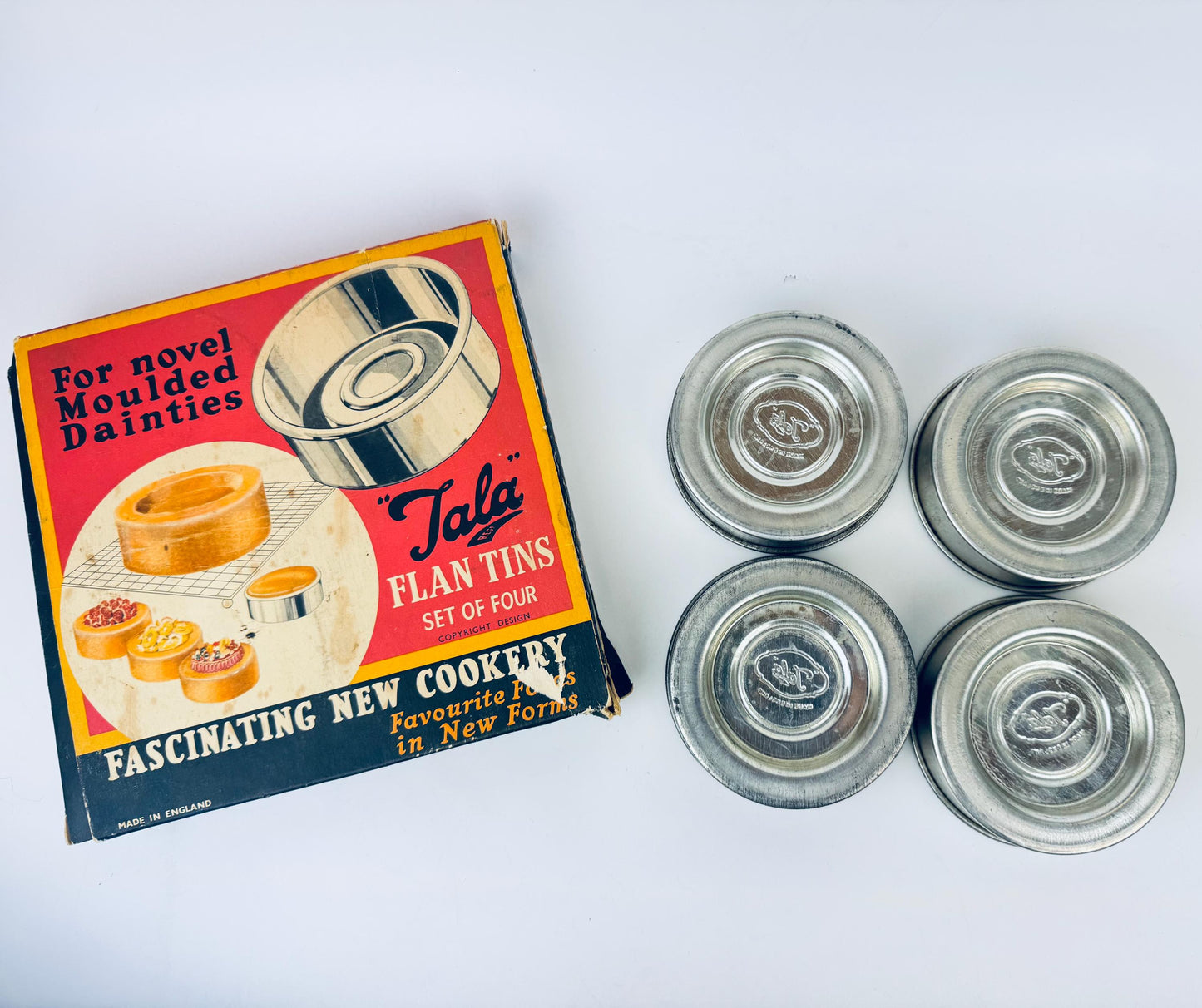 Product image for 'vintage 1950s tala flan tins set of four made in england' (view bb8e48)