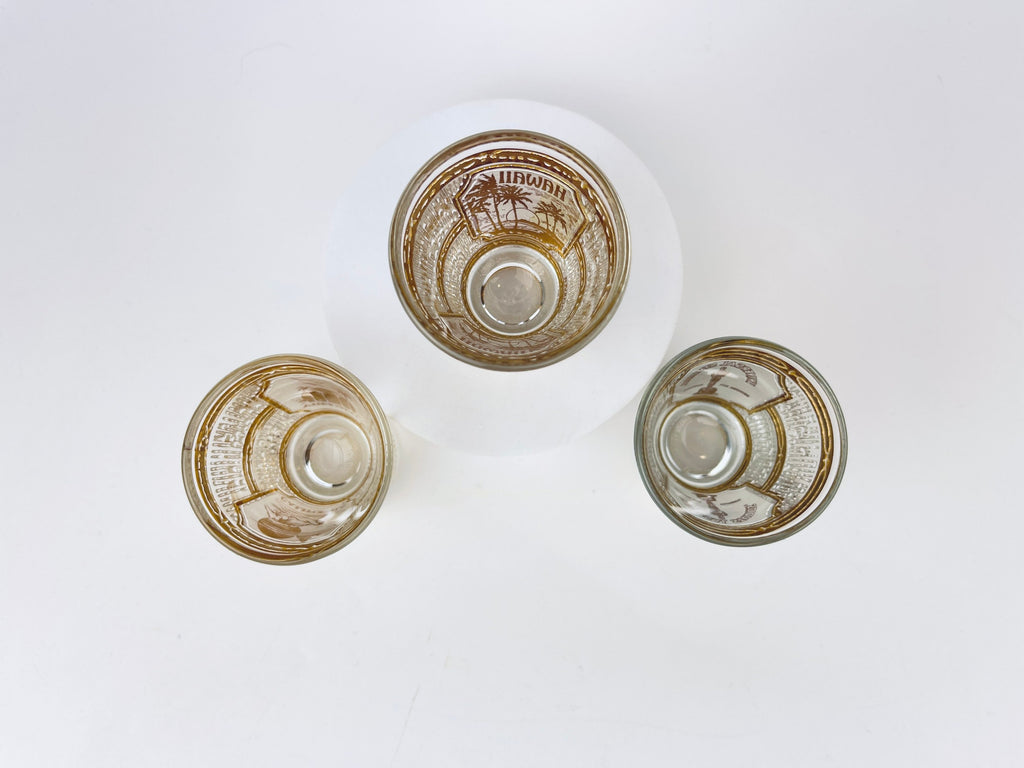 Product image for 'vintage culver tyrol heavy glass 22 kt gold souvenir shot glasses hawaii universal studios california sold individually' (view b6bac3)