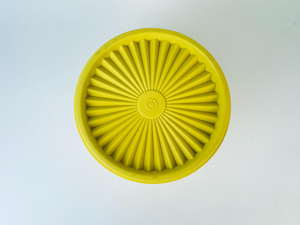 Product image for 'vintage yellow plastic tupperware servalier countertop container instant touch lid scroll pattern made in canada' (view 1c504b)