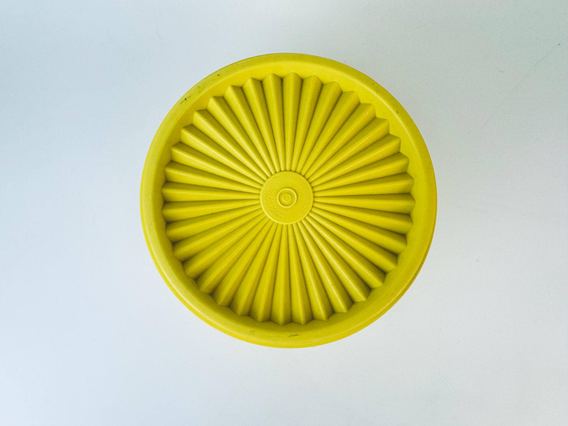 Product image for 'vintage yellow plastic tupperware servalier countertop container instant touch lid scroll pattern made in canada' (view 1c504b)