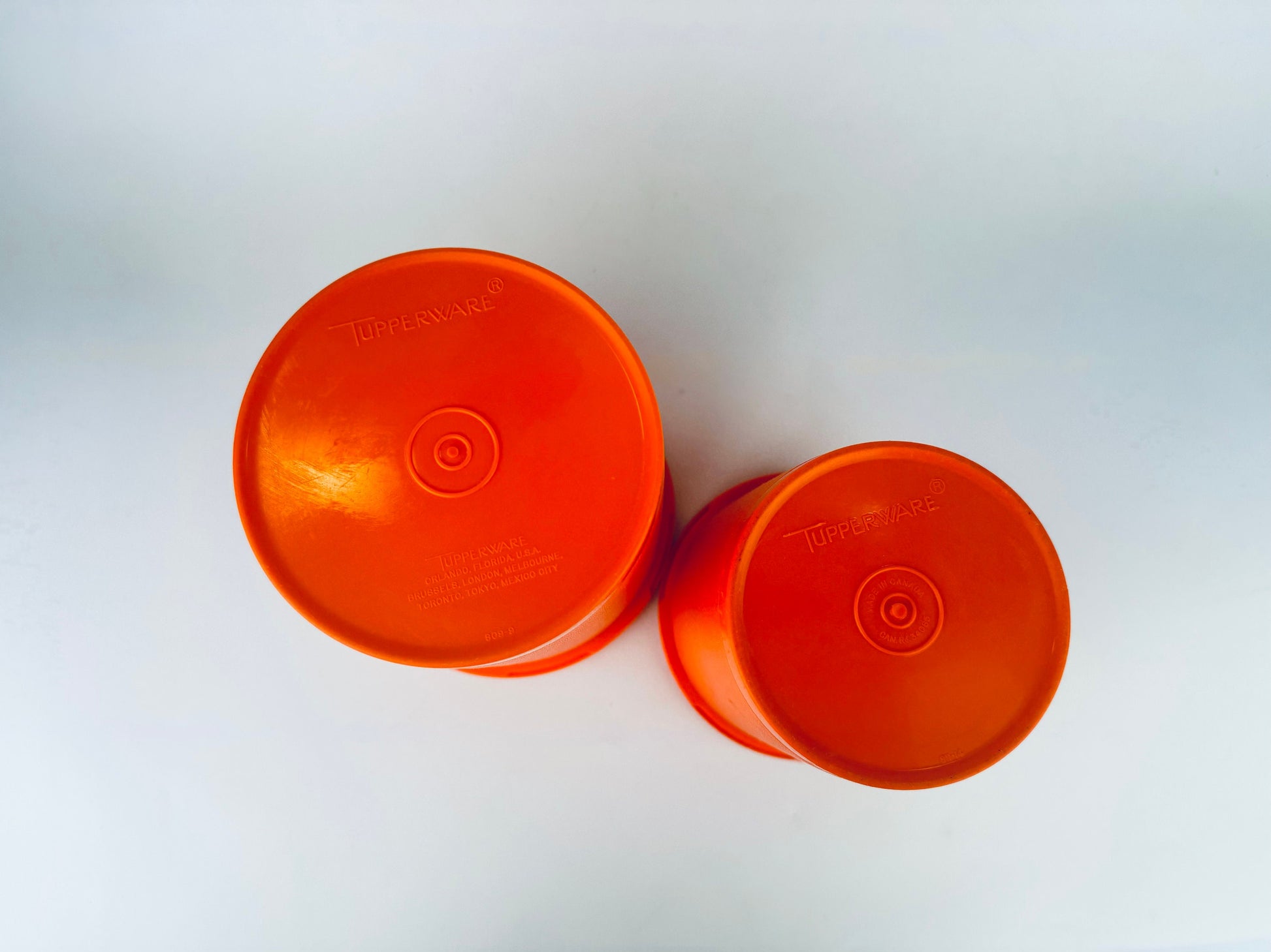 Product image for 'vintage harvest orange plastic tupperware countertop servalier container maxi canisters set of two 2' (view 8a1279)