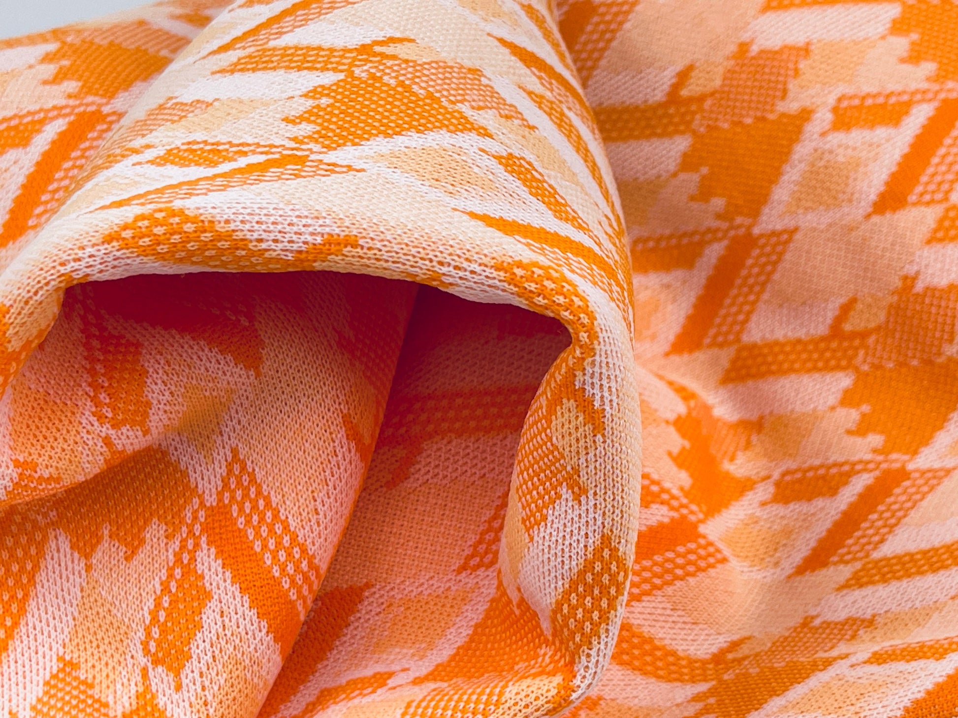 Product image for 'vintage orange white diamond polyester stretch fabric 45 x 62' (view 3d1ec8)