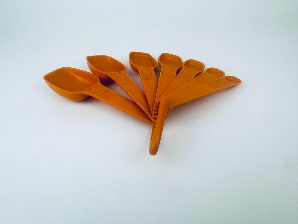 Product image for 'vintage 1980s tupperware orange plastic stacking measuring spoons classic retro kitchenware' (view a78882)
