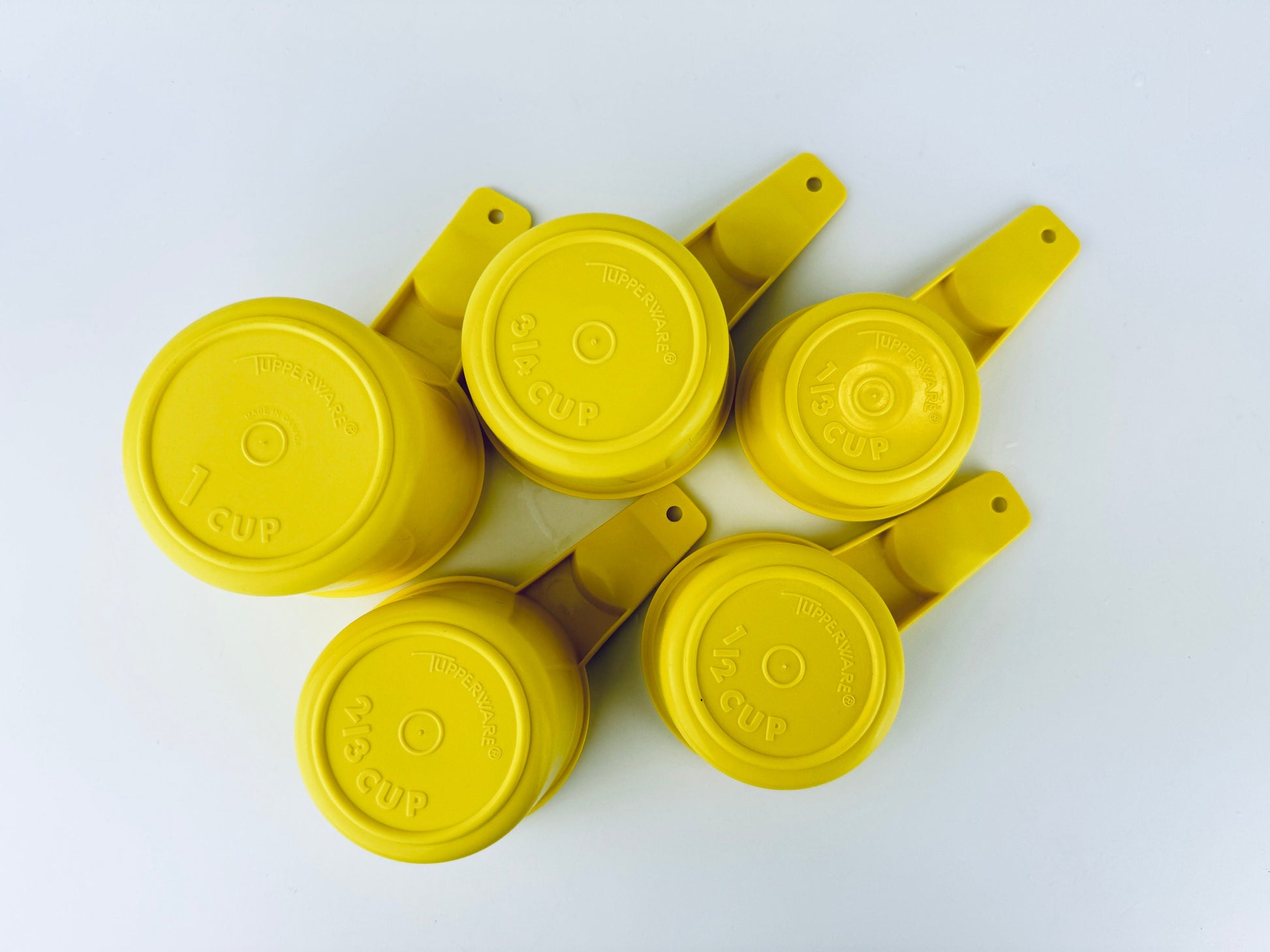Product image for 'vintage stacking plastic tupperware measuring cups set of five 5 made in canada sets sold separately' (view 492db7)