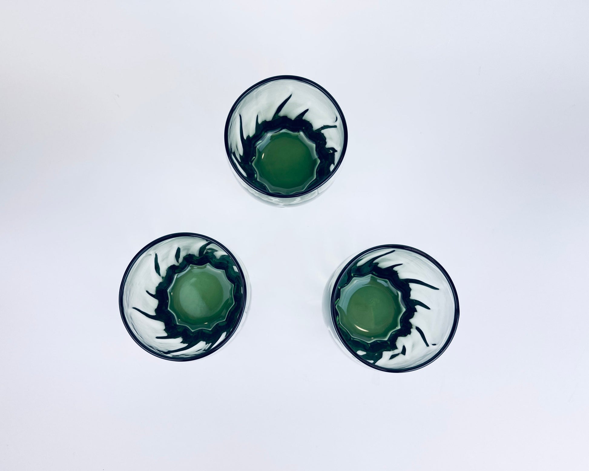 Product image for 'vintage starfire green anchor hocking glasses set of three 3 swirled bottom pattern' (view 1bd4a4)