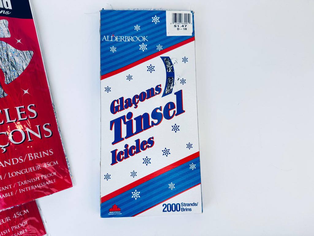 Product image for 'vintage flameproof silver christmas tree icicles tinsel strands new old stock nos packages sold separately' (view 7f799e)