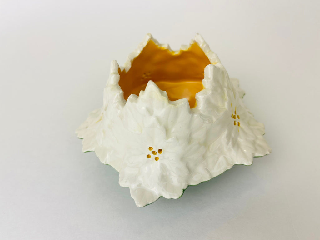 Product image for 'vintage tea light ceramic candle holder white flower green bottom' (view ce78ed)