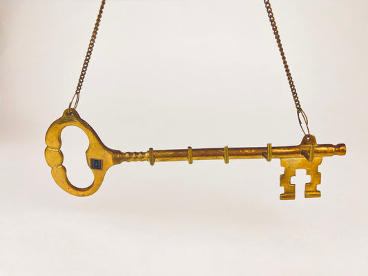 Product image for 'vintage wall mounted brass skeleton key holder four hooks' (view ee3c00)