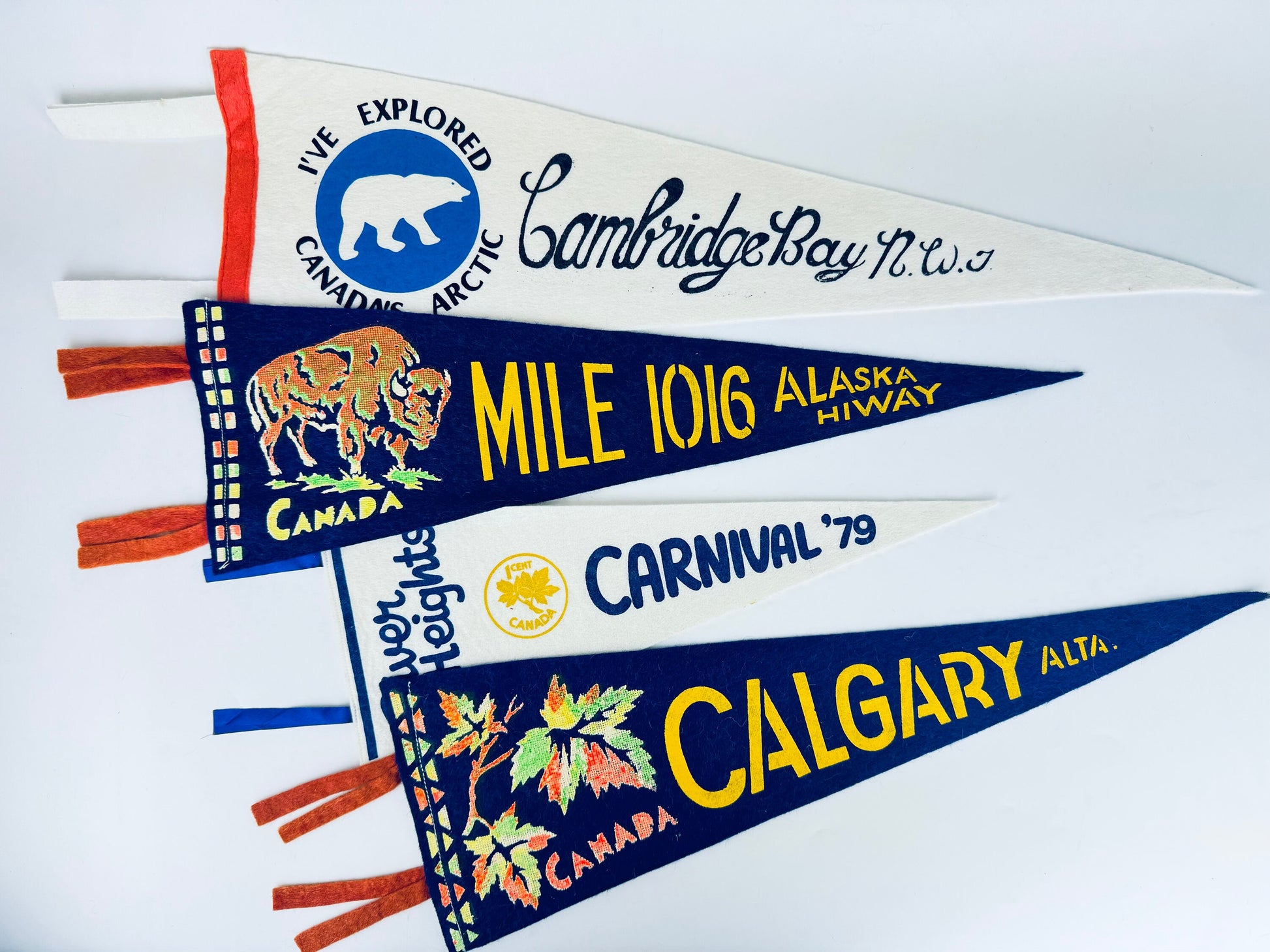 Product image for 'vintage canadian souvenir large tapered pennant wall hangings sold separately calgary alberta mile 1016 alaska highway cambridge bay' (view 55543e)