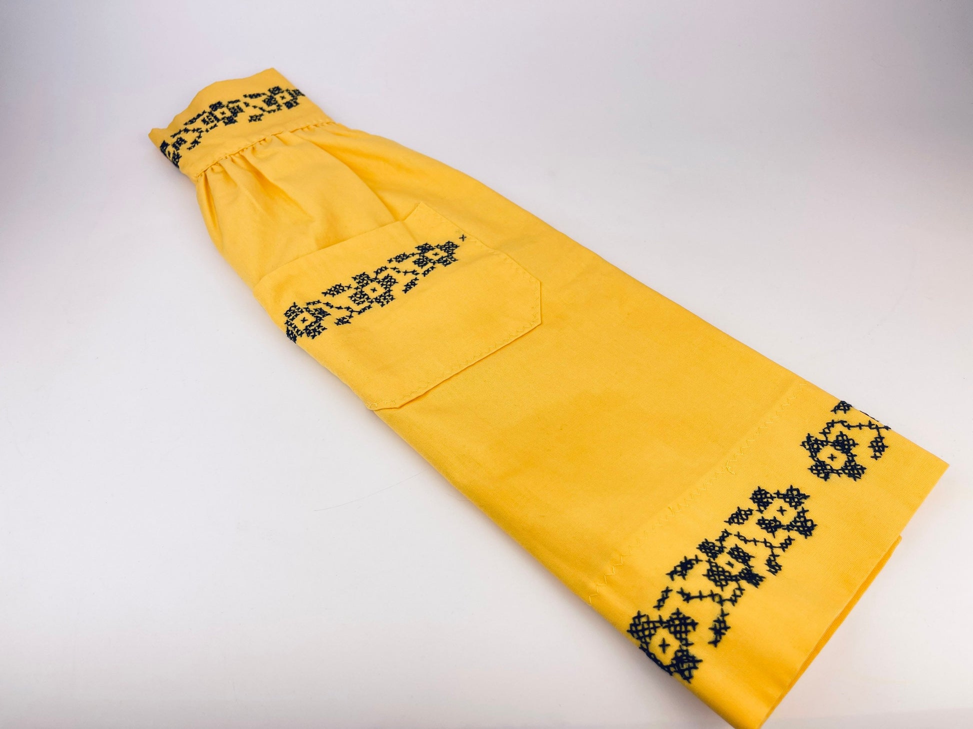 Product image for 'vintage yellow black embroidered waist apron right pocket detail' (view 1097a9)