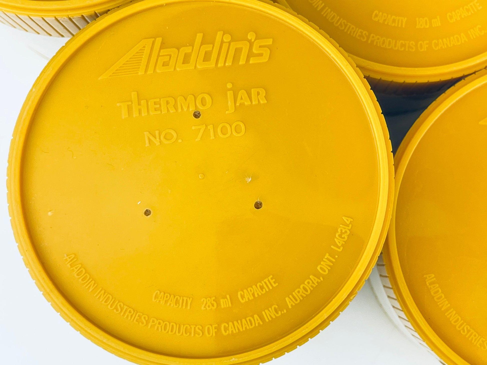 Product image for 'vintage 70s aladdin yellow beige thermos insulated vacuum sealed jar sold individually made in canada freezer lid' (view 127ff4)