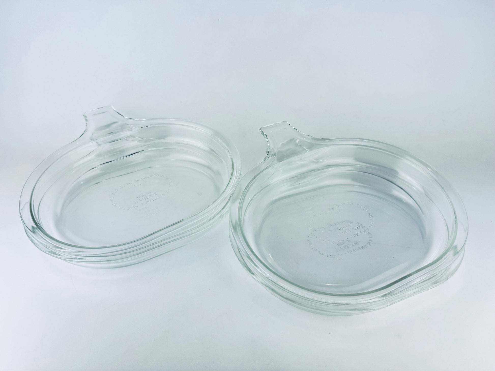Product image for 'vintage pyrex clear glass grab it microwave oven plates set of two 2 600 b 15 cm x 20 cm made in usa sets sold separately' (view 2db008)