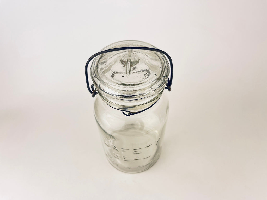 Product image for 'antique safety seal wide mouth glass jar 2 pint capacity metal hinge clasp aka lightning jar made in canada farmhouse decor' (view 7cd717)