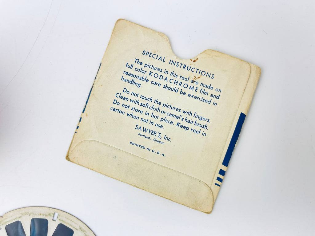 Vintage Kodak film cartridge with instructions on a white background