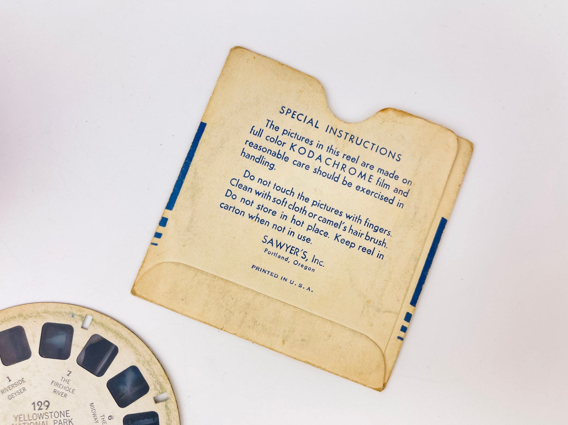 Vintage View-Master reel with instructions on a white background