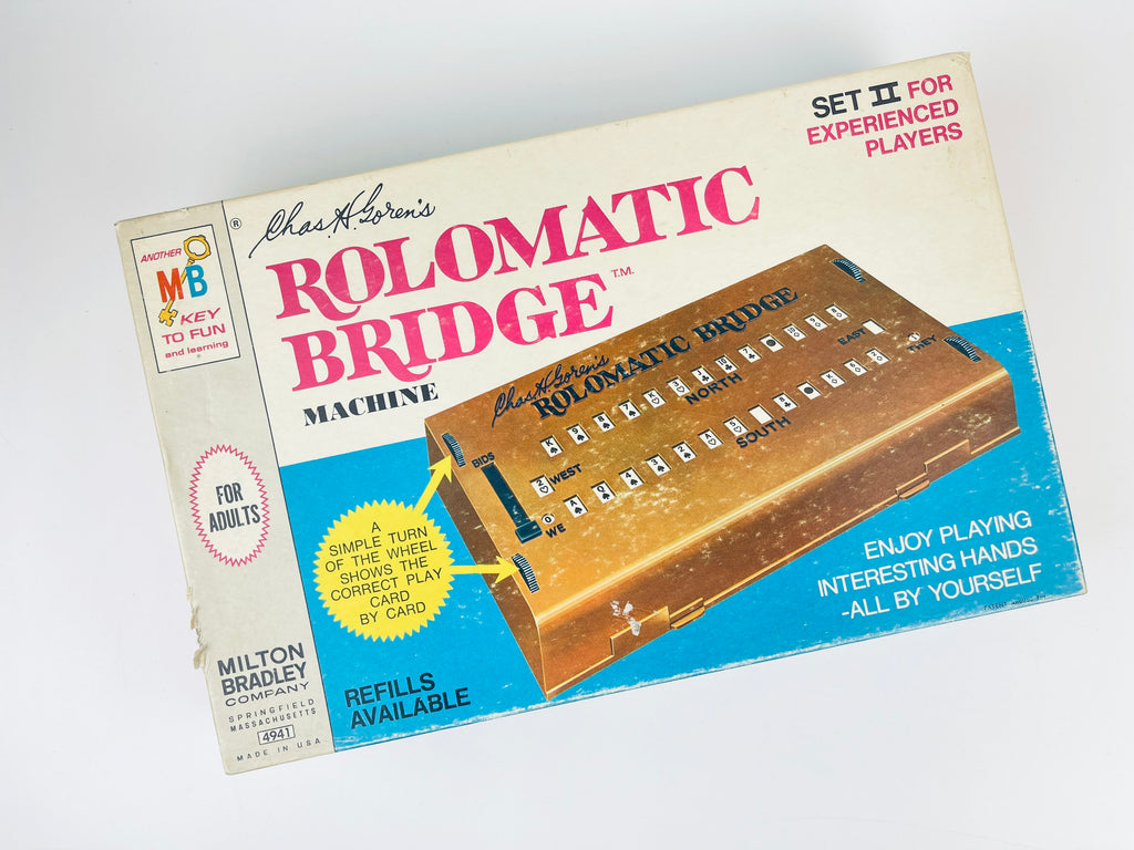 Box of Rolomatic Bridge machine by Milton Bradley on a white background