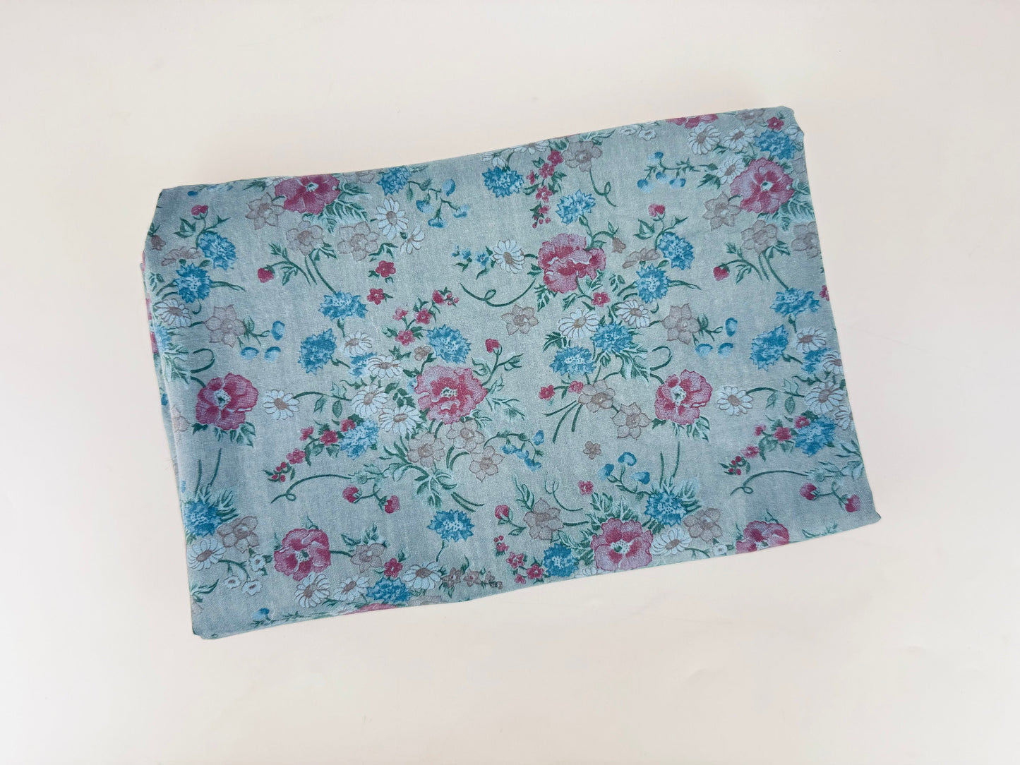Floral-patterned fabric on a white background