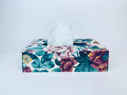 Floral-patterned tissue box on a white background