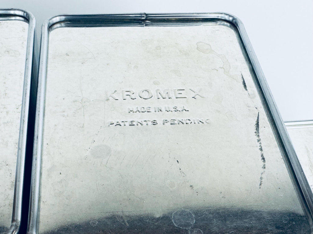 Close-up of a Kromex product with 'Made in U.S.A.' and 'Patents Pending' text