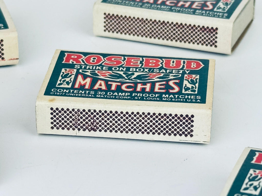 Matchbox labeled 'Rosebud Matches' on a white background