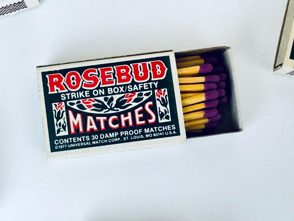 Matchbox with 'Rosebud Matches' label on a white background