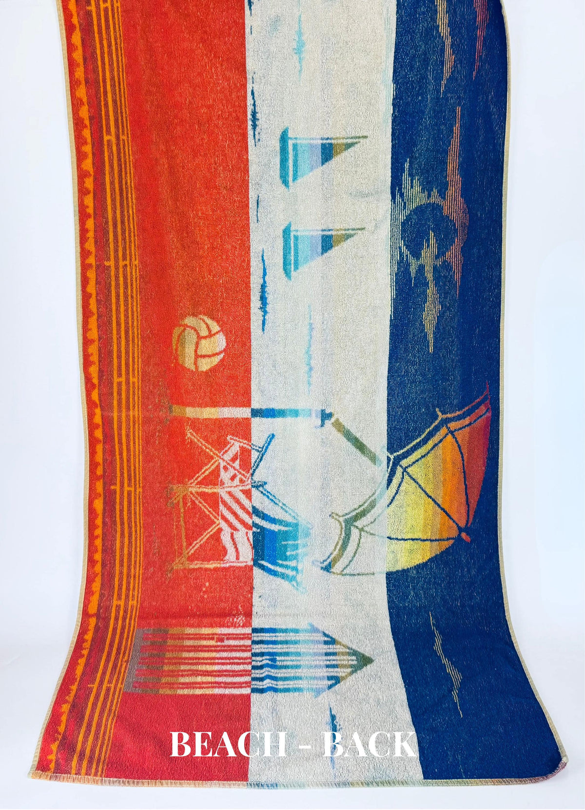 Colorful towel with beach-themed designs on a white background