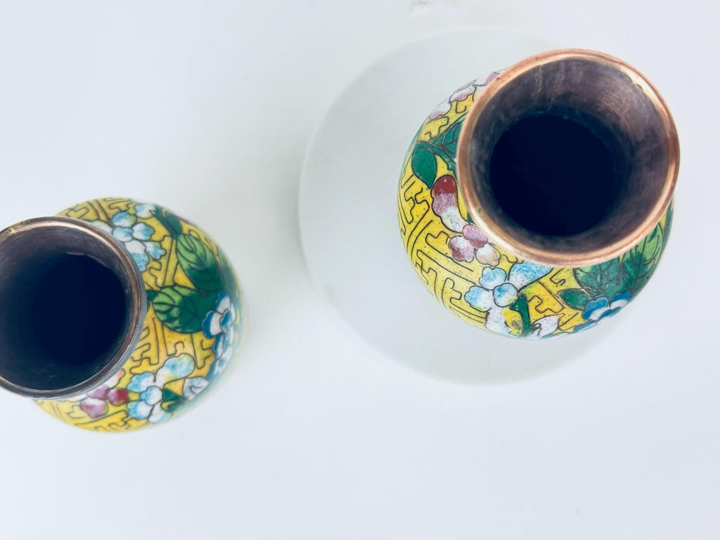 Decorative ceramic jar with floral patterns on a white background