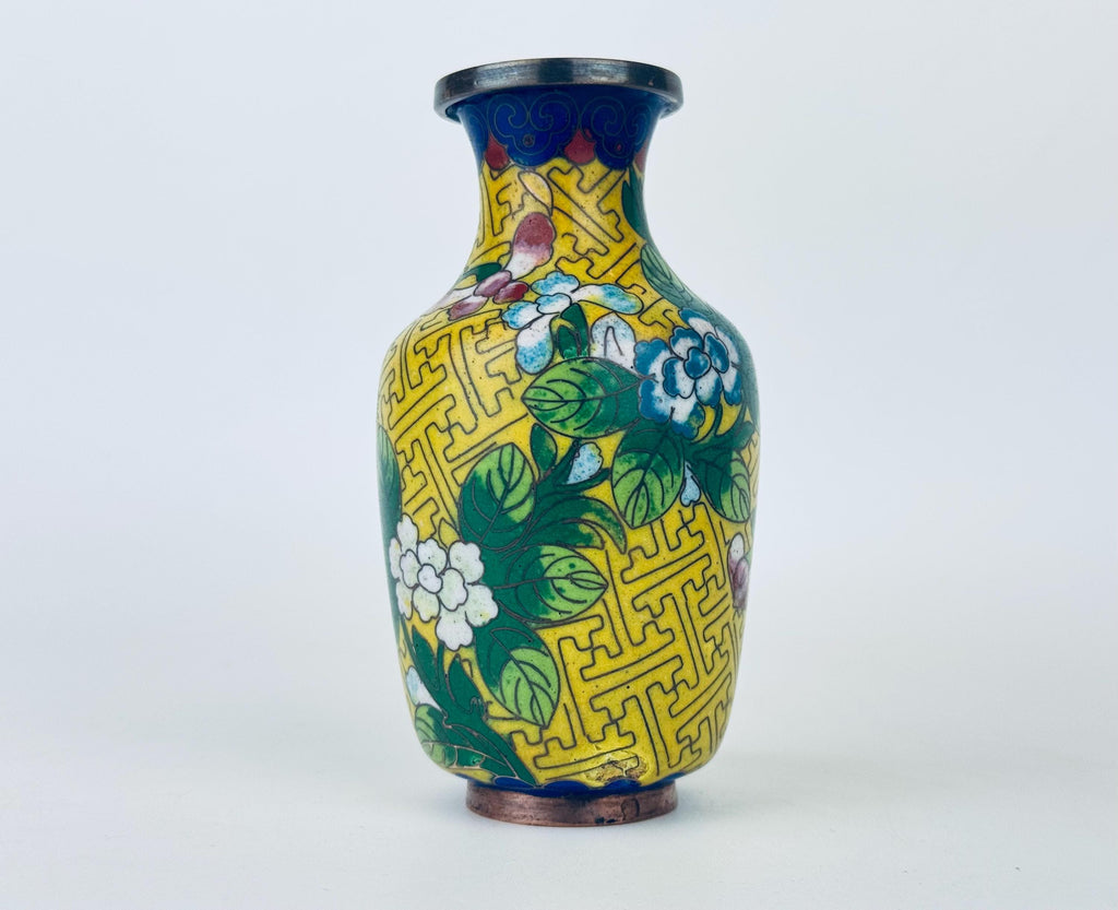 Decorative vase with floral patterns on a white background