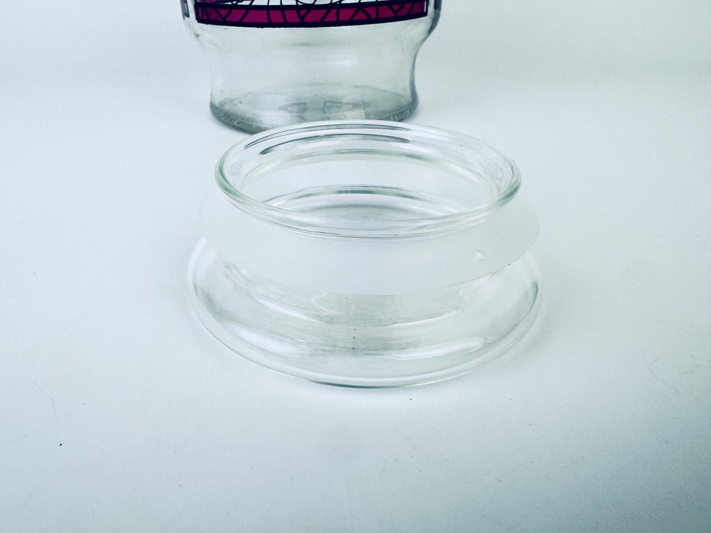 Clear glass jar on a white background