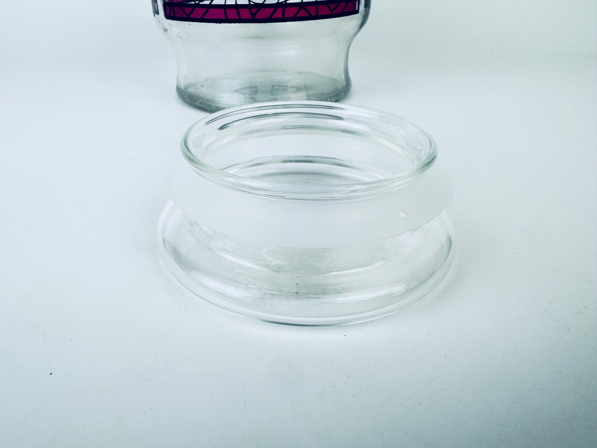 Clear glass jar on a white background