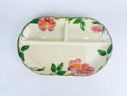 Decorative ceramic plate with floral design on a white background