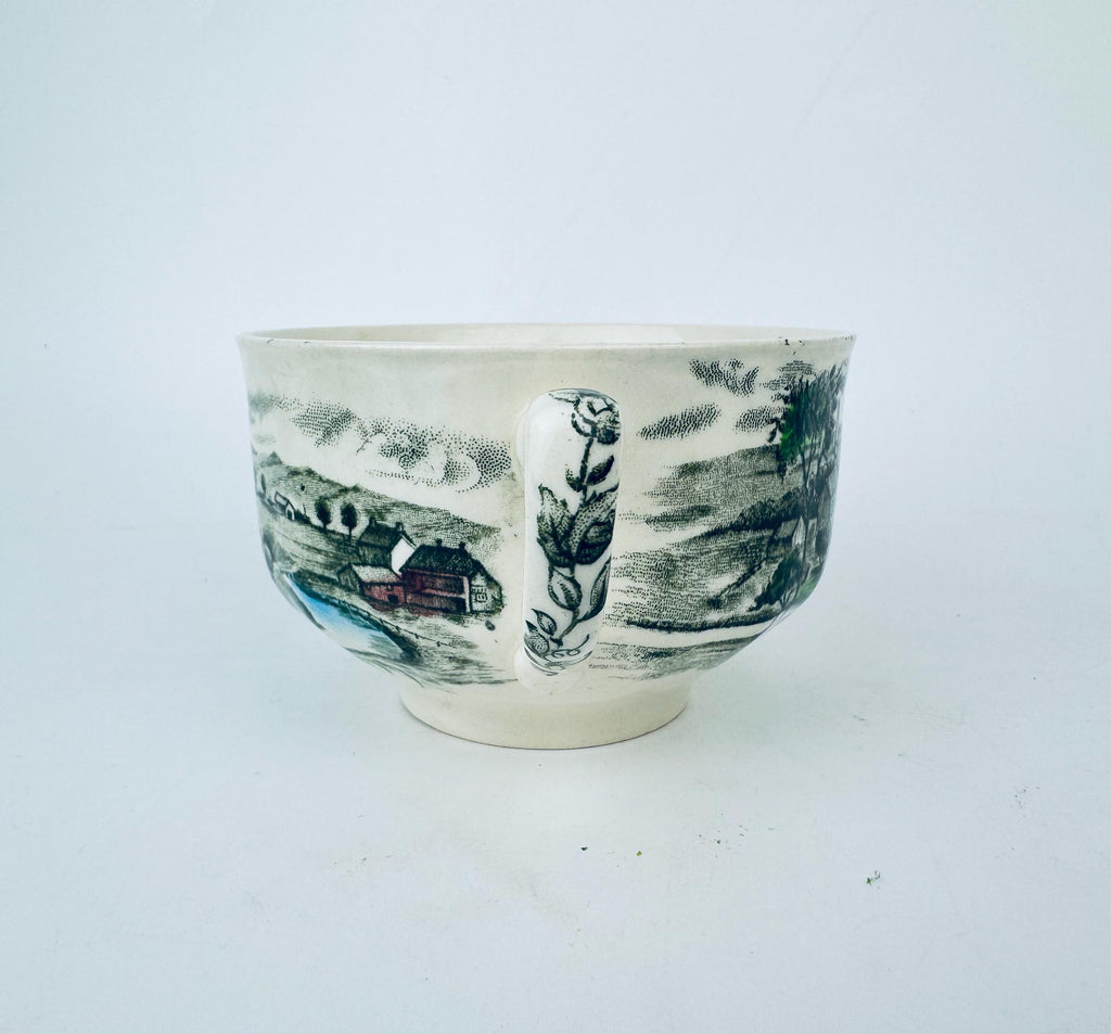 Ceramic bowl with black and white design on a white background