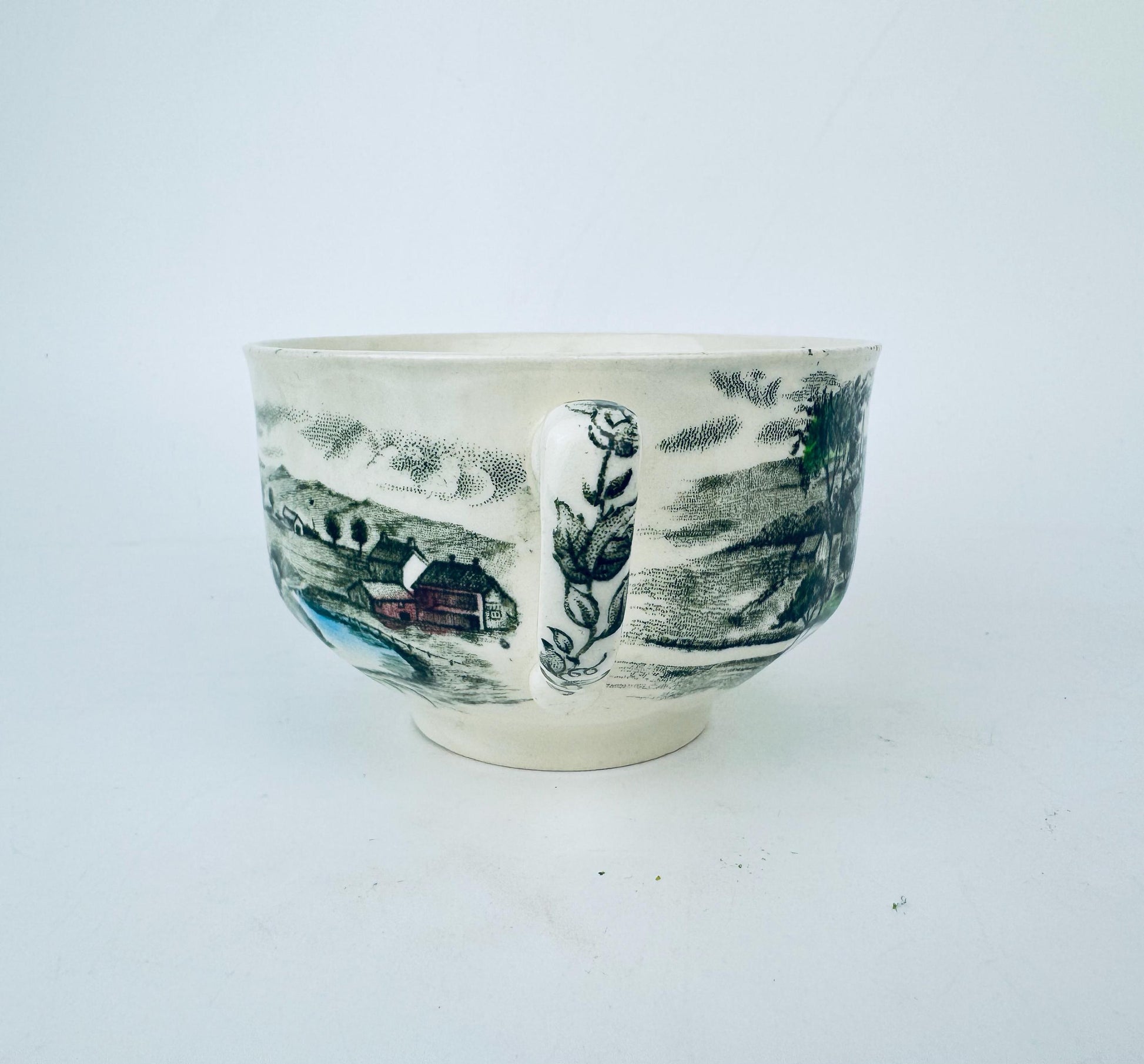 Ceramic bowl with black and white design on a white background