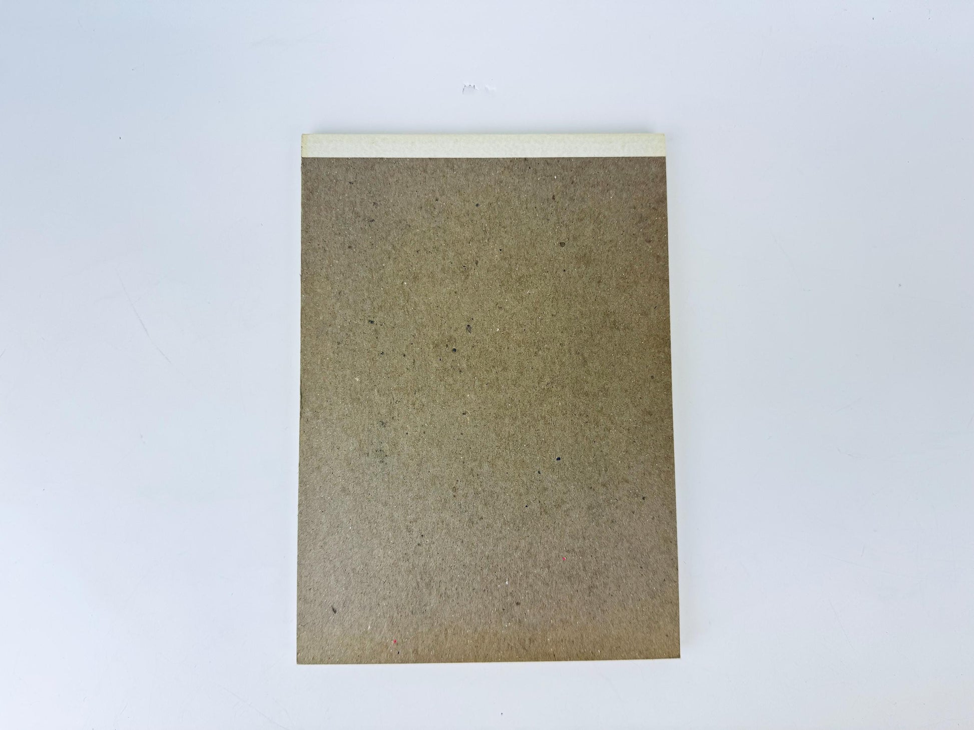 Brown notebook on a white background