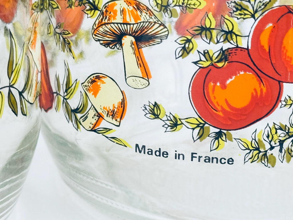 Product with a colorful design of mushrooms and tomatoes, featuring 'Made in France' text.