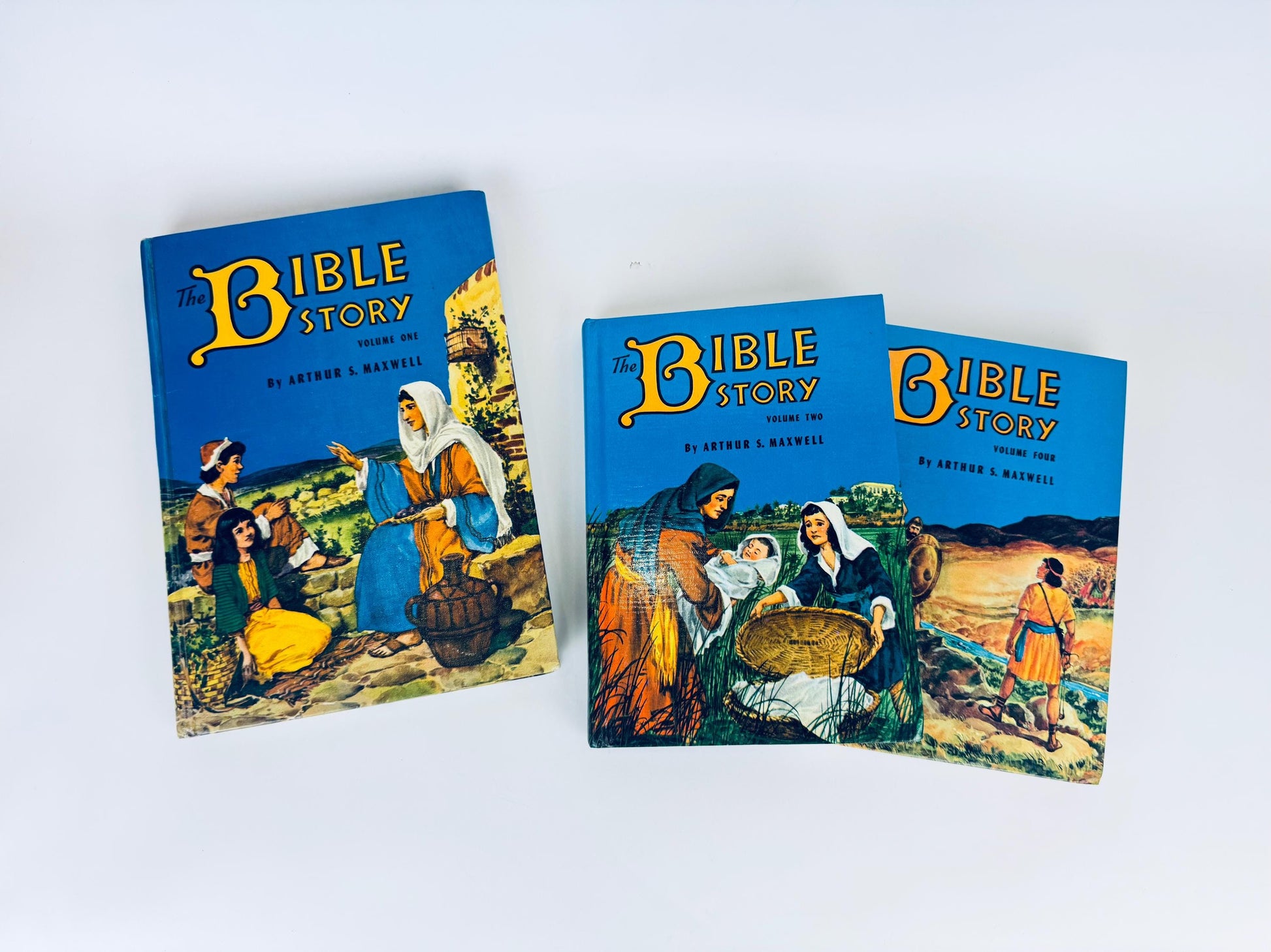 Three books titled 'The Bible Story' on a white background