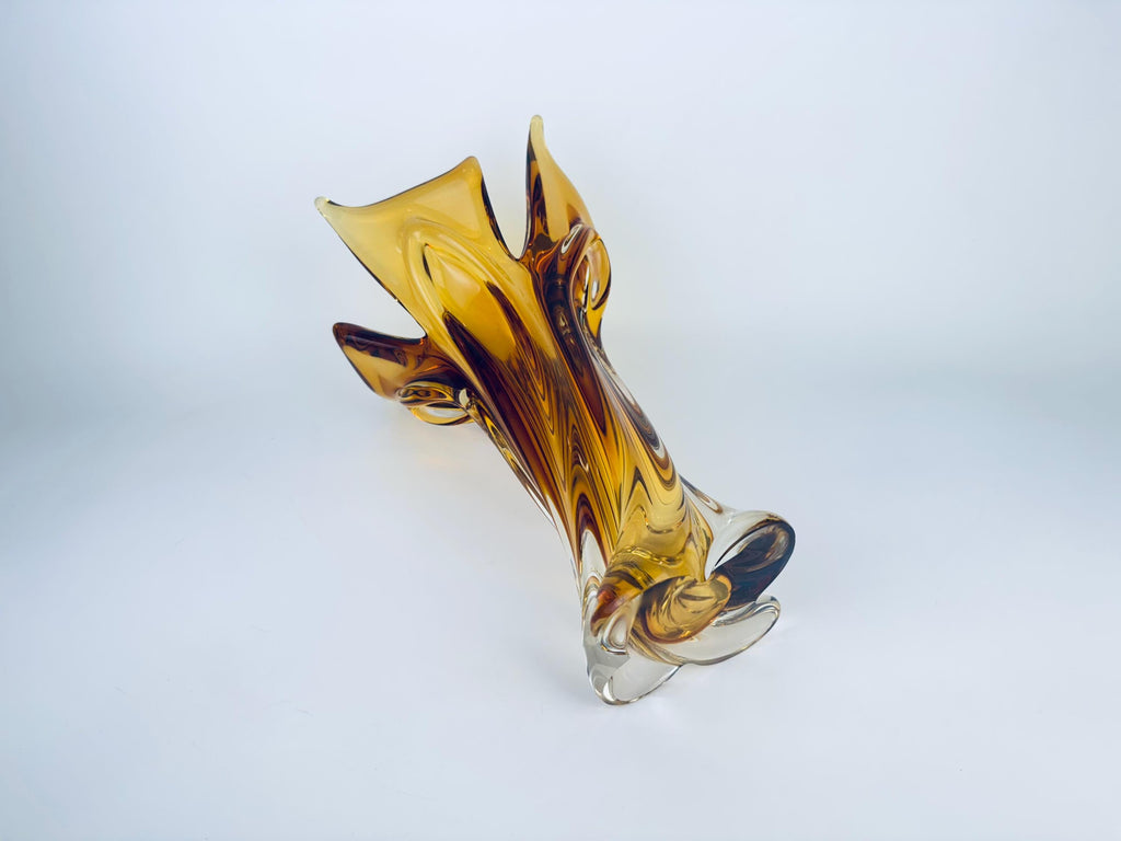 Glass vase with a unique design on a white background