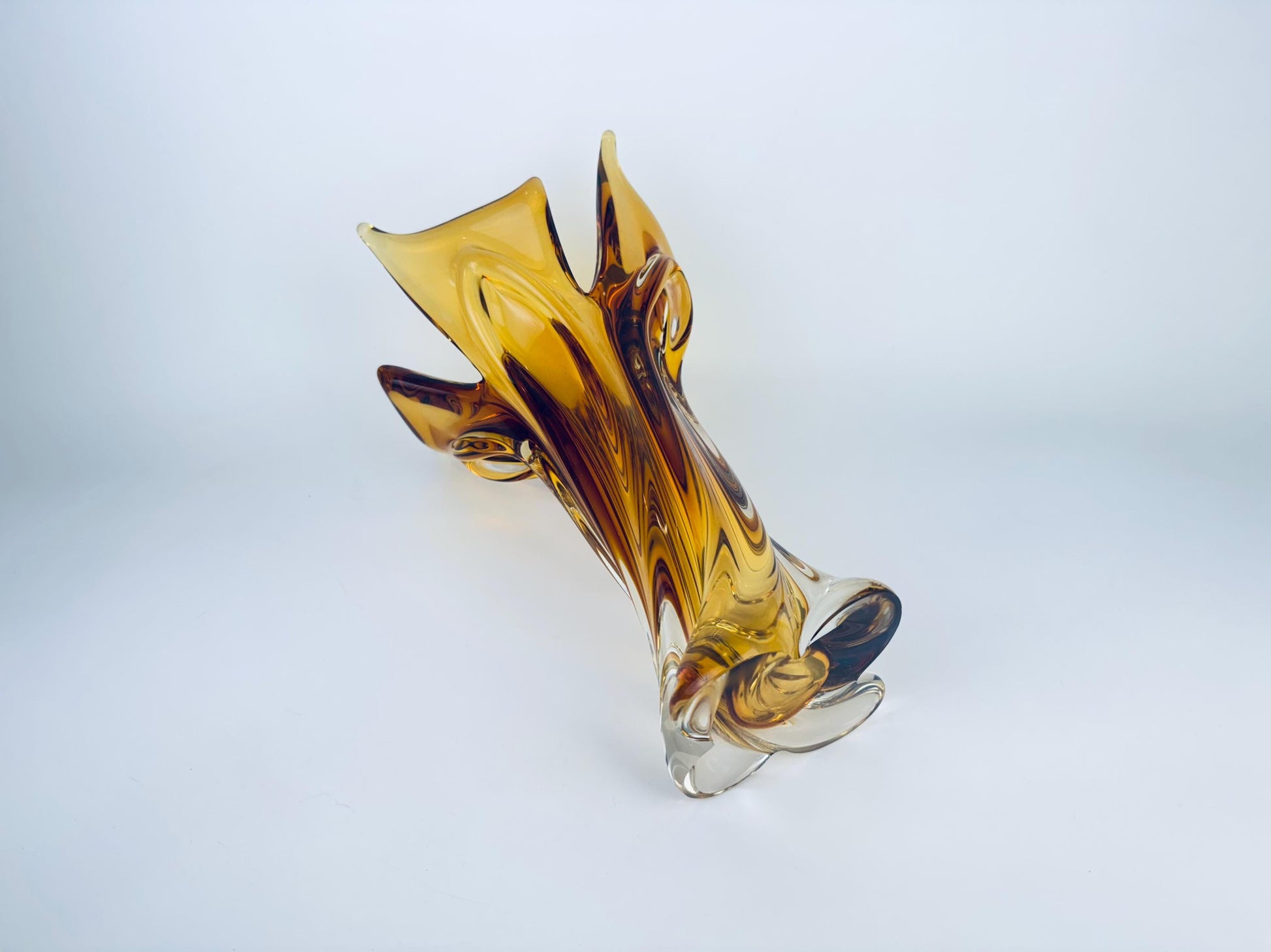 Glass vase with a unique design on a white background