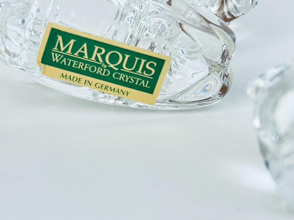 Close-up of Marquis by Waterford sticker on crystal nativity animal figurine, reading ‘Made in Germany