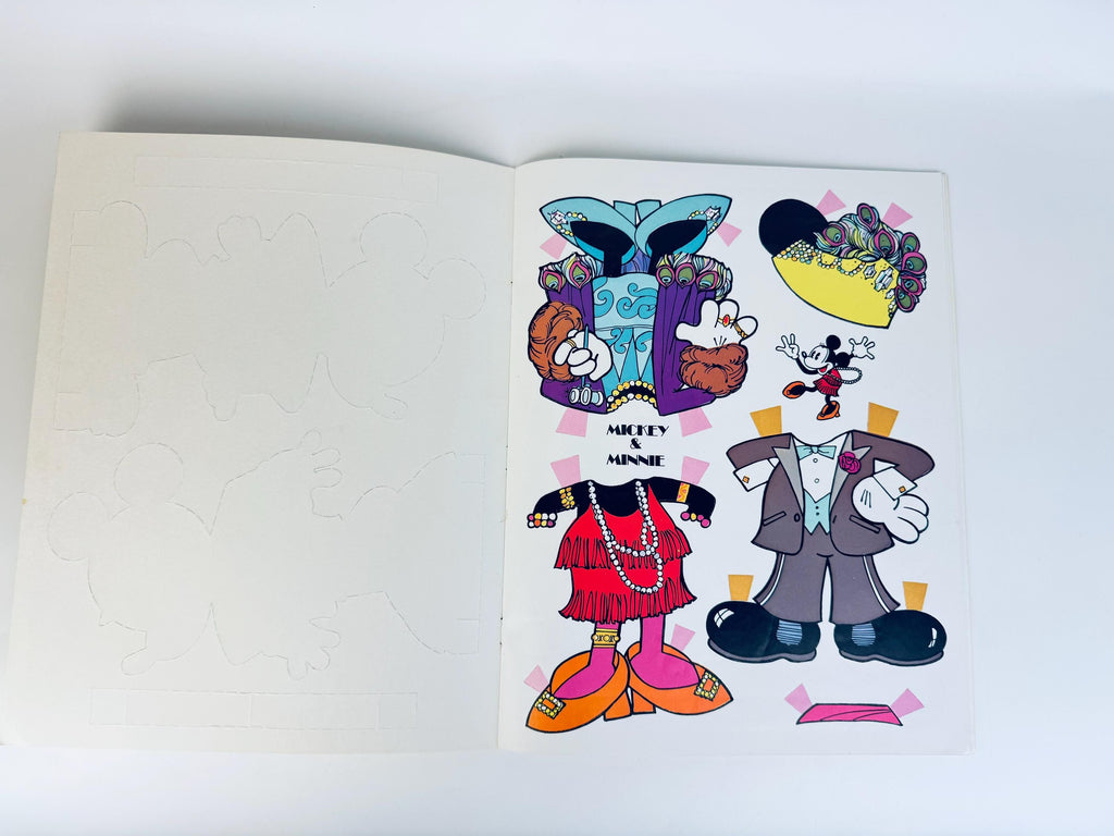 Interior sheet of full-colour paper doll clothing and accessories for Mickey and Minnie